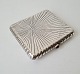 Russian 
cigarette case 
in silver with 
sapphire set in 
14 kt gold 
Measure 9 x 10 
cm.
Stamped: ...