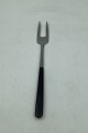 Erik Herlow 
Steel Flatware 
Contrast Cold 
Meat Fork
Measures 
13,6cm / 5.35 
inch