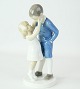 Figure by Bing & Grøndahl in porcelain of motif with boy and girl no. 1781Dimensions in cm: ...