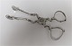 Antique silver 
candle 
scissors. 
Length 11.5 cm.