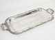 Elongated dish 
in 
silver-plated 
brass from 
around the 
1930s.
Dimensions in 
cm: H:4 W:63 
D:27
