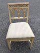 Chair, classic, 1800 - 1820. Denmark. Painted with gildings. Padded with striped fabric. H .: ...
