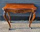 Danish nyrococo 
game table in 
mahogany, 19th 
century. With 
capriole legs 
with carvings. 
With ...