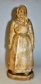 Ølsgaard, Elias 
(1887 - 1964) 
Denmark: Woman 
in regional 
costume. 
Signed: Elias 
Ølsgaard 1913. 
...