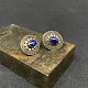 Diameter 1.5 cm.A nice pair of oval earrings with dark blue stones.They are stamped 925 ...