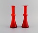 Holmegaard / 
Kastrup. Two 
Carnaby vases 
in red mouth 
blown art 
glass. 1960s.
Measures: 21 x 
7.7 ...