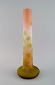 Émile Gallé (1846-1904), France. Vase in frosted and light green art glass carved in the form of ...