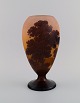Émile Gallé (1846-1904), France. Rare vase in mouth blown art glass. Lake landscape with trees ...
