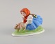 Herend figure in hand-painted porcelain. Peasant girl with piglet. Mid-20th century.Measures: ...
