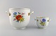 Meissen wine 
cooler and vase 
in hand-painted 
porcelain with 
flowers and 
gold edge. 
Handles ...