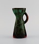 Paul Dresler (1879-1950) for Grotenburg, Germany. Jug in glazed stoneware. 
Beautiful crackle glaze in shades of red and green. 1930s / 40s.
