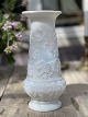 Old, white vase in opal glass with relief decoration in the form of ivy and acanthus leaves. ...