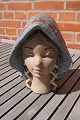 Lladro ceramics and stoneware, Spain.Beautiful and detailed female face with bonnet of ...