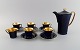 Crown Devon, 
England. Art 
deco coffee 
service for 
five people in 
navy blue 
porcelain, 
gilded ...