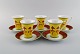 Paul Wunderlich 
for Rosenthal. 
Five Bokhara 
porcelain 
coffee cups 
with saucers. 
Colorful 
design, ...