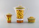 Paul Wunderlich for Rosenthal. Bokhara coffee pot, sugar bowl and creamer. 
Colorful design, late 20th century.
