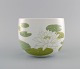 Timo Sarpaneva for Rosenthal. Rare Suomi bowl in porcelain decorated with water 
lilies. 1970s / 80s.
