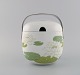 Timo Sarpaneva 
for Rosenthal. 
Rare Suomi ice 
bucket in 
porcelain 
decorated with 
water lilies. 
...