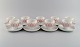 Bjørn Wiinblad 
for Rosenthal. 
Lotus porcelain 
service. 9 
coffee cups 
with saucers 
decorated with 
...