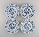 Four antique Meissen Blue Onion dinner plates in hand-painted porcelain. Approx. 
1900.
