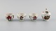 Antique Chinese 
lidded jar and 
three cups in 
hand-painted 
porcelain with 
flowers. 19th 
...