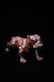 Old bulldog in painted papier-mâché / plaster with a really nice patina.H:11,5cm. L:22cm.