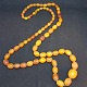 Antique Butterscotch baltic sea amber necklace with olive shaped beads. Length 72 cm. Weight ...