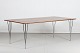 Piet Hein 
(1905-1996) + 
Bruno Mathsson
Large working 
table made of 
walnut veneer 
with ...