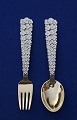 A. Michelsen Christmas spoons and forks of Danish gilt sterling silver. Anton Michelsen set ...