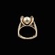 Knud V. 
Andersen / A. 
Michelsen. 14k 
Gold Ring with 
Pearl.
Designed by 
Knud V. 
Andersen and 
...