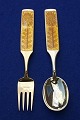 Michelsen Christmas spoons and forks of Danish gilt sterling silver. Anton Michelsen set ...