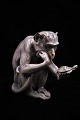 Large porcelain 
figure from 
Bing & Grondahl 
of a sitting 
monkey holding 
a small turtle. 
...