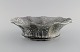 Svend Hammershøi for Kähler. Wavy edged bowl in glazed stoneware. Beautiful 
gray-black double glaze. 1930s / 40s.
