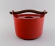 Timo Sarpaneva for Rosenlew, Finland. Cast iron casserole in red enamel with 
wooden handle. Mid-20th century.
