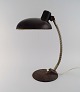 Adjustable designer desk lamp. Industrial design, mid 20th century.Height: 43 cm.Foot ...