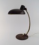 Adjustable 
designer desk 
lamp. 
Industrial 
design, mid 
20th century.
Height: 43 cm.
Foot ...