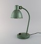 Adjustable desk 
lamp in 
original mint 
green lacquer. 
Industrial 
design, mid 
20th ...