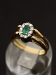 18ct Gold 
Turntable Ring 
Size 53 Emerald 
Surrounded by 
Diamonds 
Opposite 
Sapphire Item 
No. 501195
