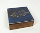 Rosewood box with a patterned blue ceramic lid from around the 1960s.Dimensions in cm: H:4 ...
