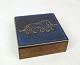 Rosewood box 
with a 
patterned blue 
ceramic lid 
from around the 
1960s.
Dimensions in 
cm: H:4 ...