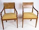A pair of Danish Empire hand-polished mahogany armchairs with intarsia in the back of the chair ...