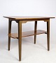 Side table in 
walnut wood 
with a nice 
structure on 
the top, as 
well as a shelf 
from around the 
...