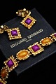 Vintage Edouard Rambaud jewelry, consisting of gold-plated earrings and necklace with colored ...