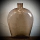 Danish Pocket Ark of brown glass. Blown into shape and blown off with the sand at the bottom. H. ...