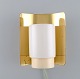 Hans Agne Jakobsson for A / B Markaryd. Wall lamp in brass and lacquered metal. Swedish design, ...