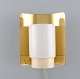 Hans Agne 
Jakobsson for A 
/ B Markaryd. 
Wall lamp in 
brass and 
lacquered 
metal. Swedish 
design, ...