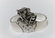 Silver napkin 
ring (830). HC 
Andersen 
fairytale. 
Shepherdess and 
the Chimney 
Sweep