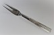 Champagne. O.V. 
Mogensen. 
Silver (830). 
Cold cuts fork. 
Length 12 cm.