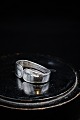 Old napkin ring in silver, stamped. 4,5x3,2cm. Width 1,5cm.