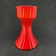 Height 20 cm.Red Carnaby pitcher with white inside from Holmegaard Glasværk.Most of The ...